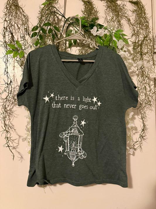 There is a Light Smiths Medium Tshirt