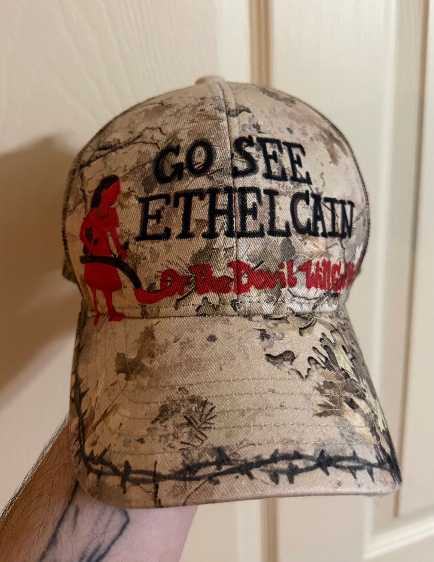 Cain Trucker Hat