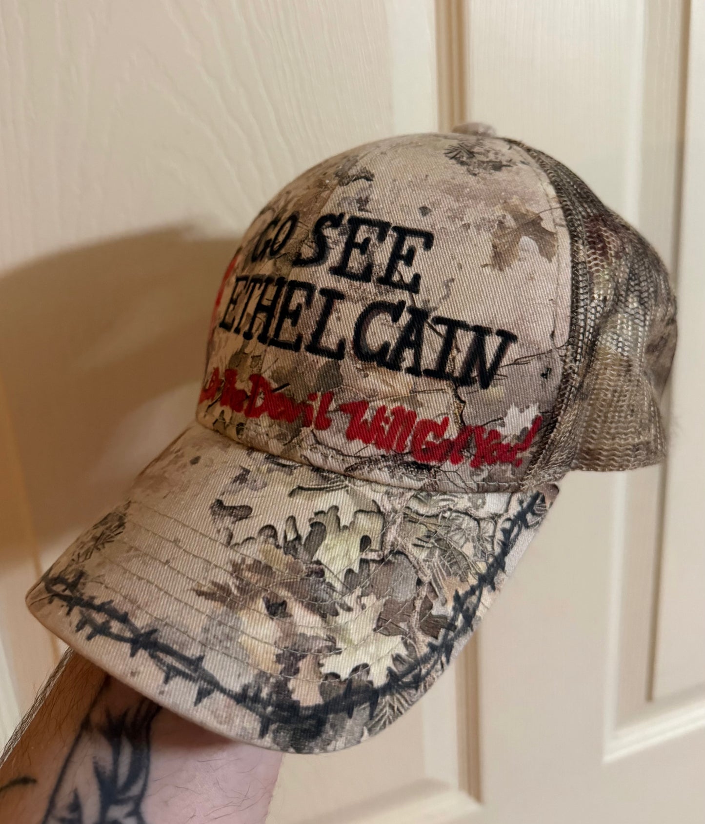 Cain Trucker Hat